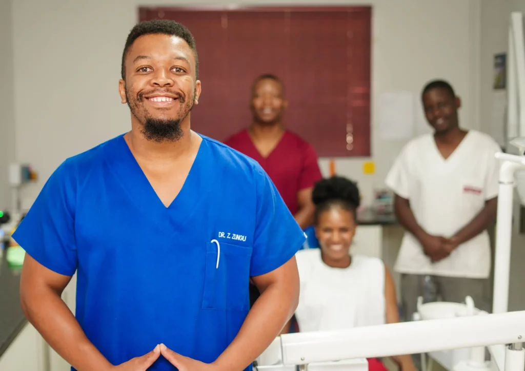 A portrait of Dr Zsazsanov Zungu Smiling