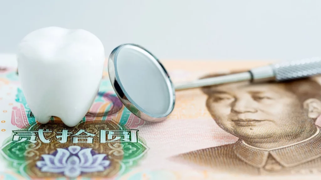 dental tools on top of money